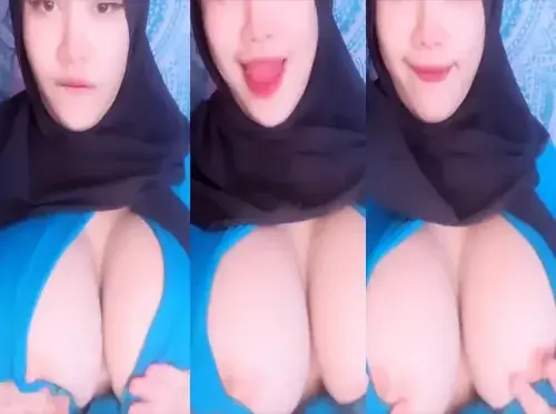Bokep Jilbab Pamer Dada Montok Tanpa BH backdrop